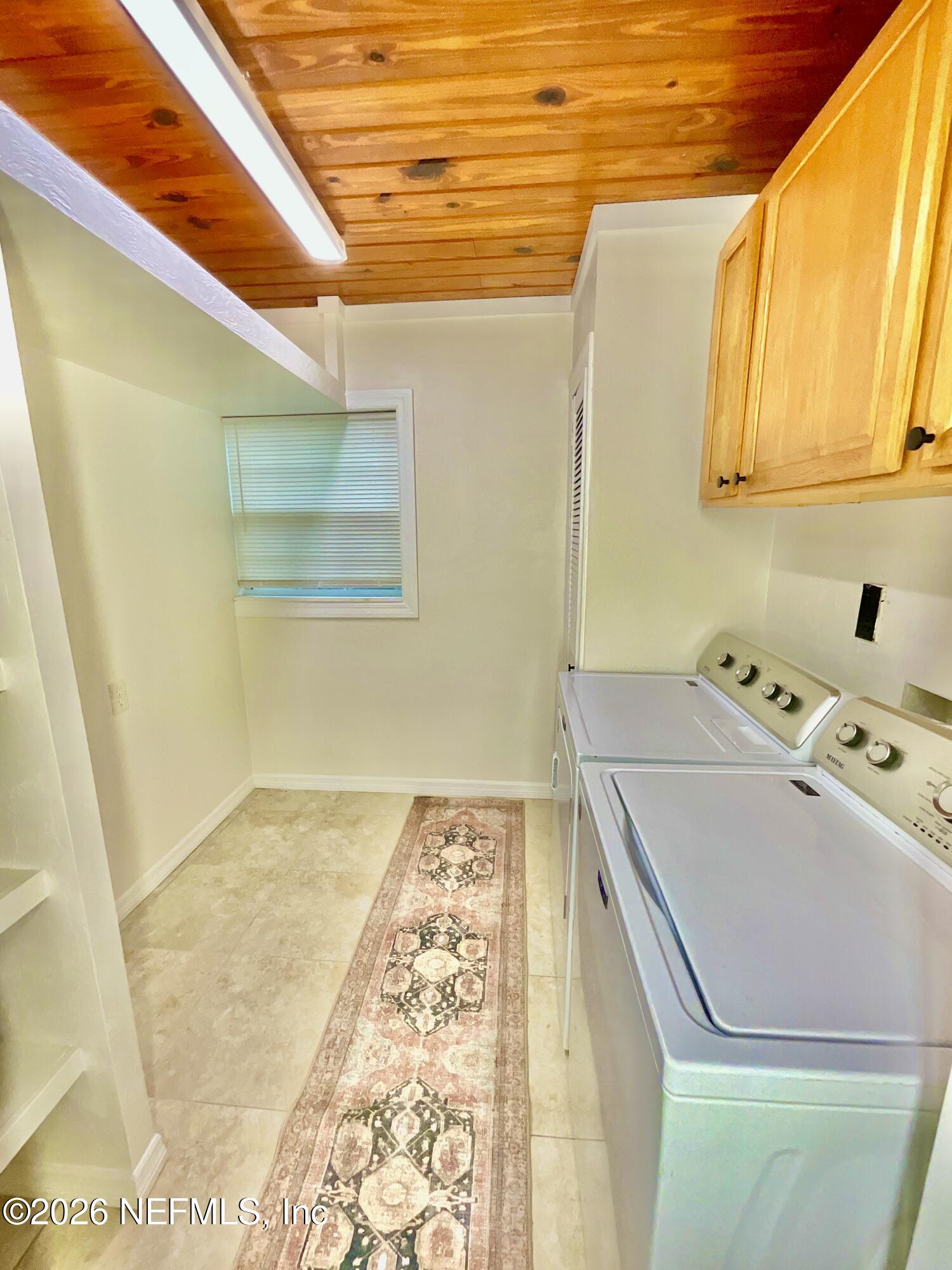 17221 Northeast 77th Lane Hawthorne, FL 32640 - Photo 42 of 59 a utility room with a washer and dryer
