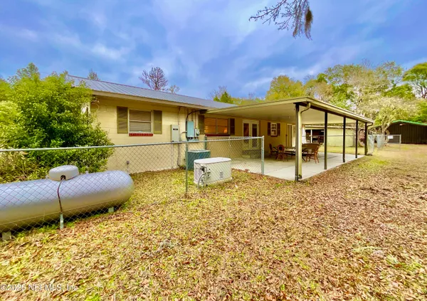 a view of a house with a swimming pool