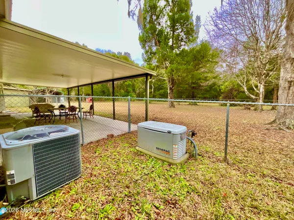 a view of a house with a garage