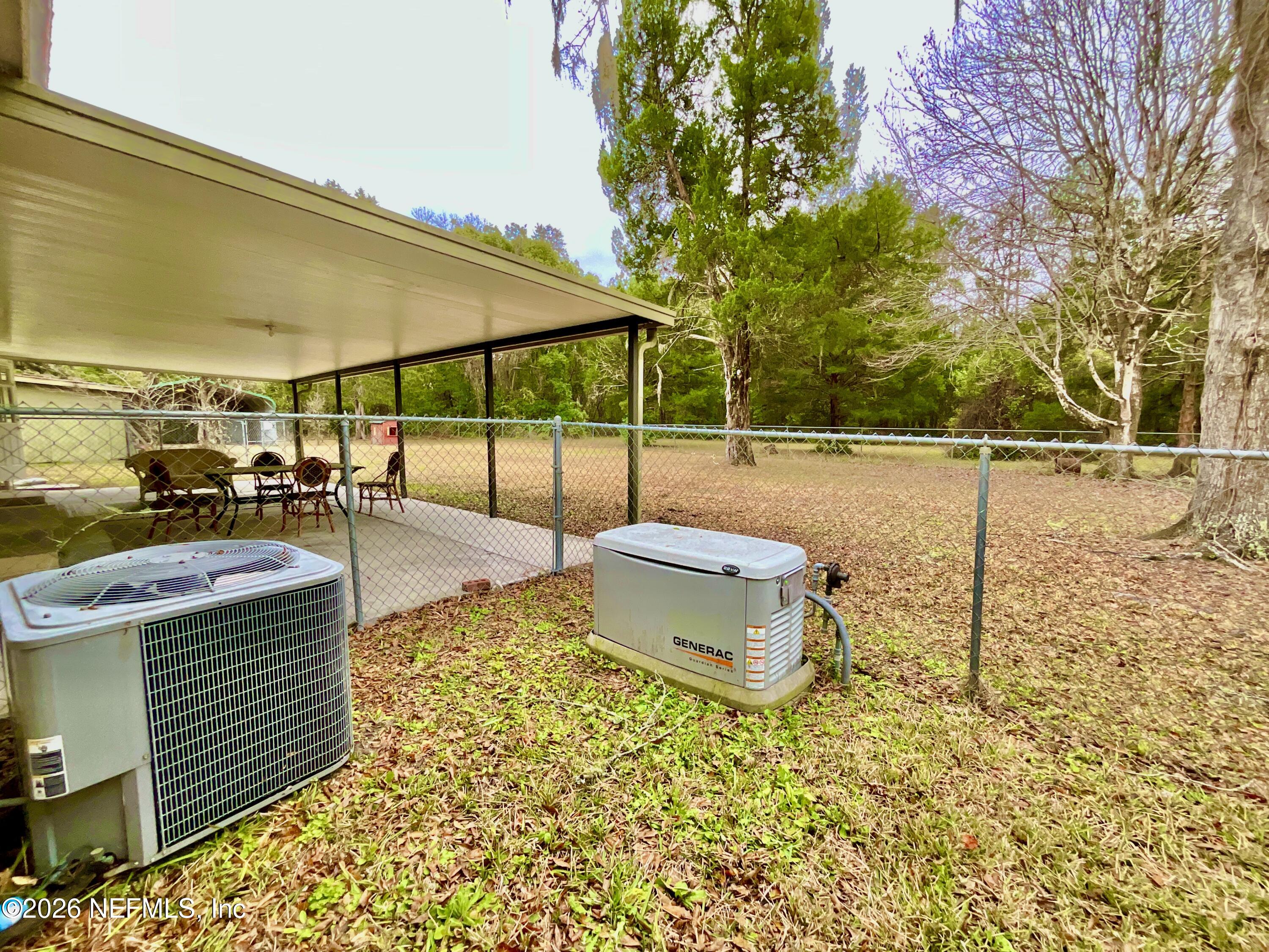 17221 Northeast 77th Lane Hawthorne, FL 32640 - Photo 48 of 59 a outdoor view with a sitting space