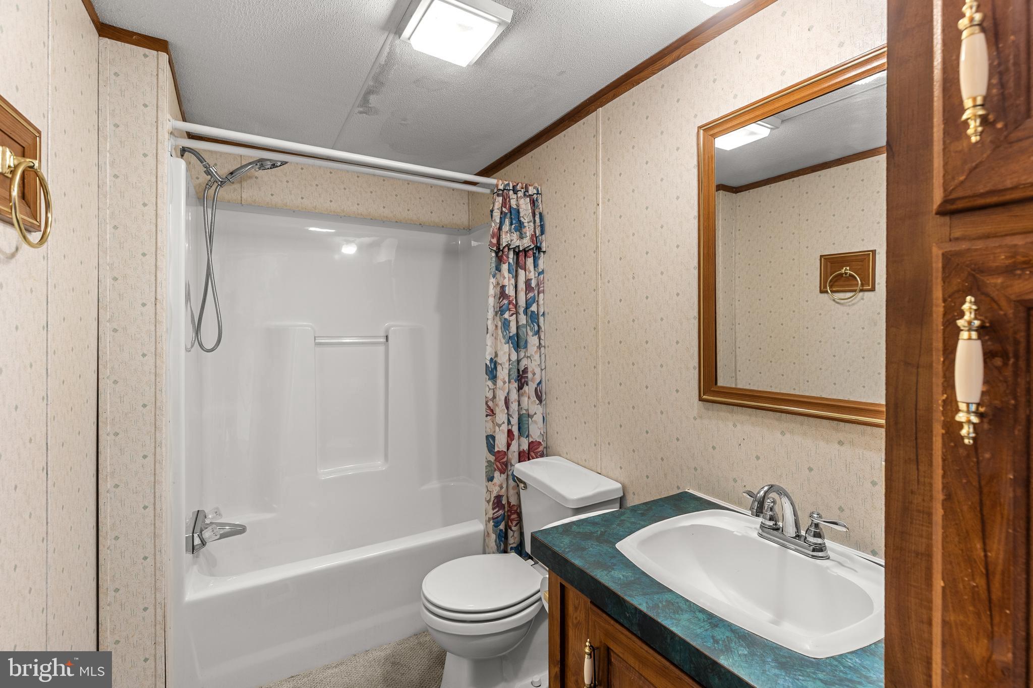 111 Pheasant Ridge Circle Lancaster, PA 17603 - Photo 26 of 29 a bathroom with a sink a toilet and shower