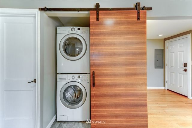 a view of washer and dryer in a bathroom