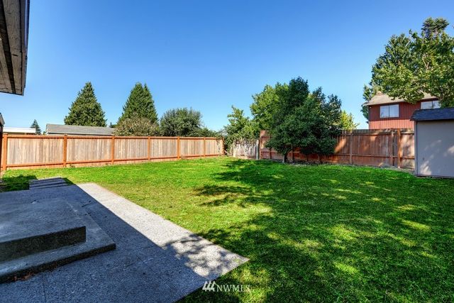 a view of a backyard with a garden