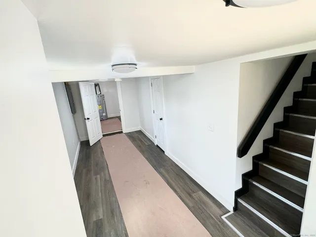 a view of entryway with stairs