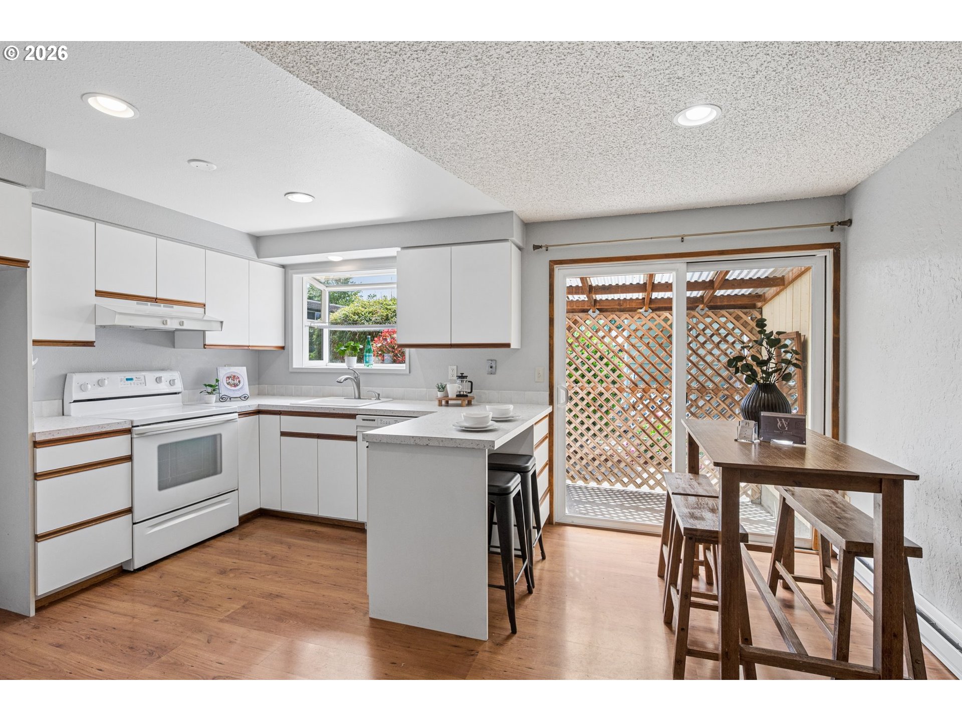 255 West Berkeley Street Gladstone, OR 97027 - Photo 12 of 37 a kitchen with a sink cabinets and window