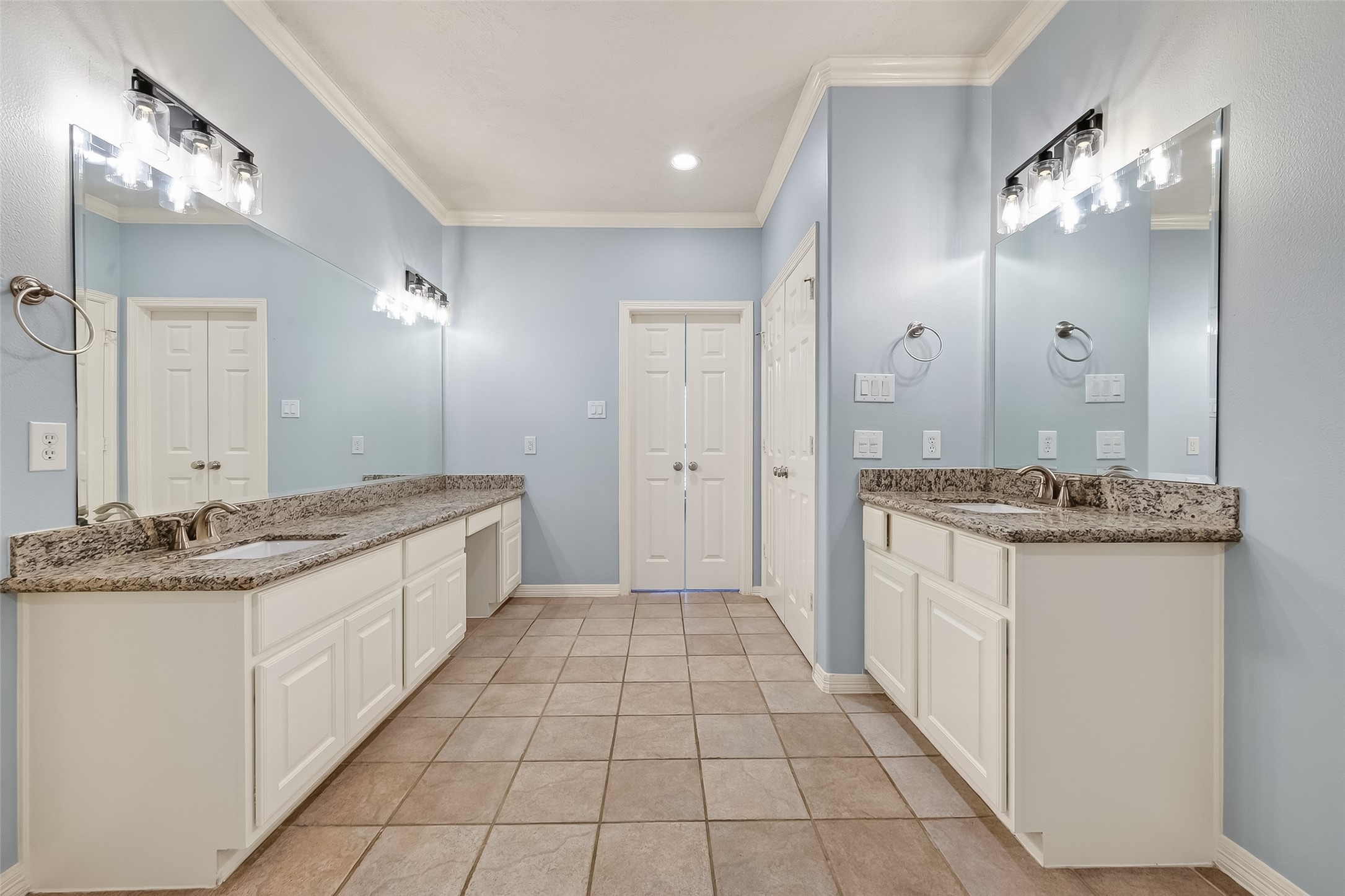5835 Val Verde Street Houston, TX 77057 - Photo 18 of 21 a large bathroom with a granite countertop double vanity sink a mirror and a shower