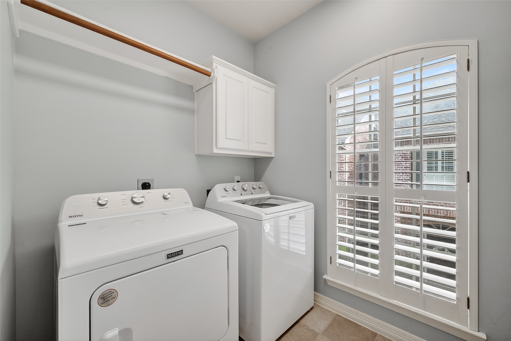 5835 Val Verde Street Houston, TX 77057 - Photo 10 of 21 a view of storage and utility room with washer and dryer