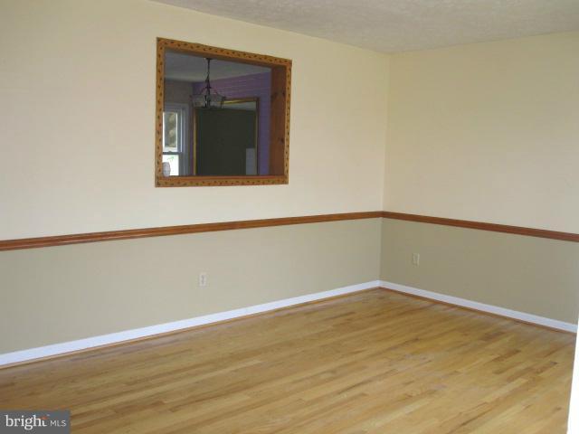 11 Vivian Drive Inwood, WV 25428 - Photo 17 of 21 Living Room with pass thru to Kitchen