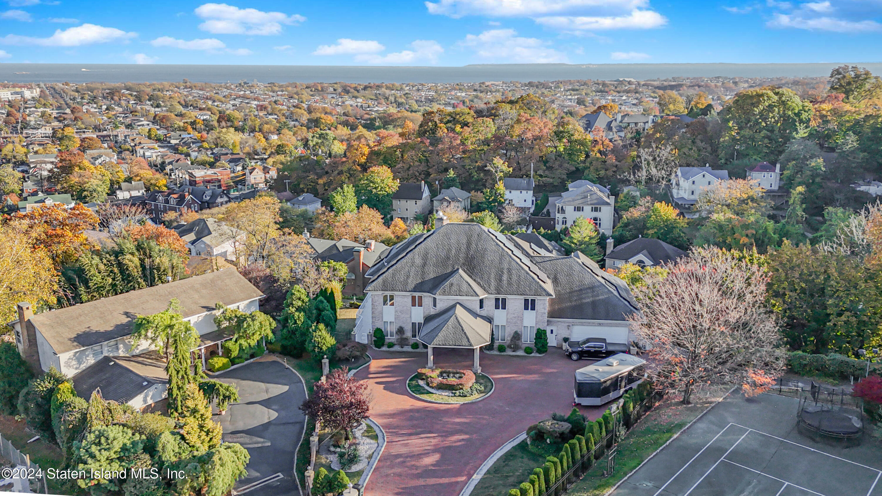 12 Romer Road Staten Island, NY 10304 - Photo 3 of 63 an aerial view of a house with garden space and ocean view