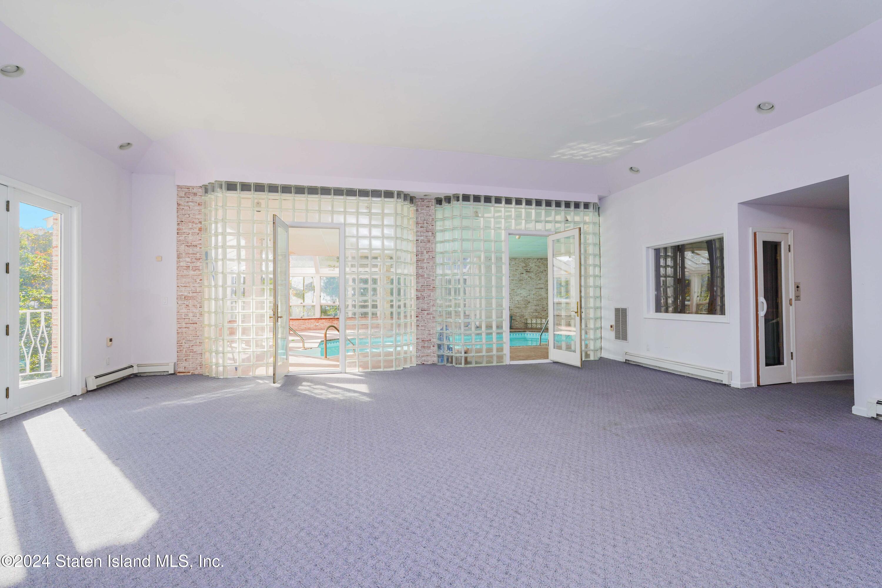 12 Romer Road Staten Island, NY 10304 - Photo 51 of 63 a view of empty room with floor to ceiling window
