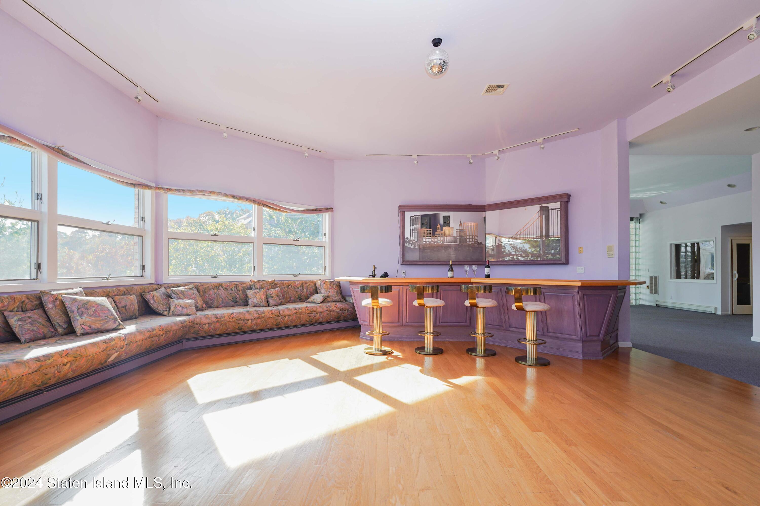 12 Romer Road Staten Island, NY 10304 - Photo 57 of 63 a living room with furniture and a large window