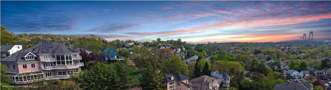 12 Romer Road Staten Island, NY 10304 - Photo 60 of 63 a view of a city with lush green forest