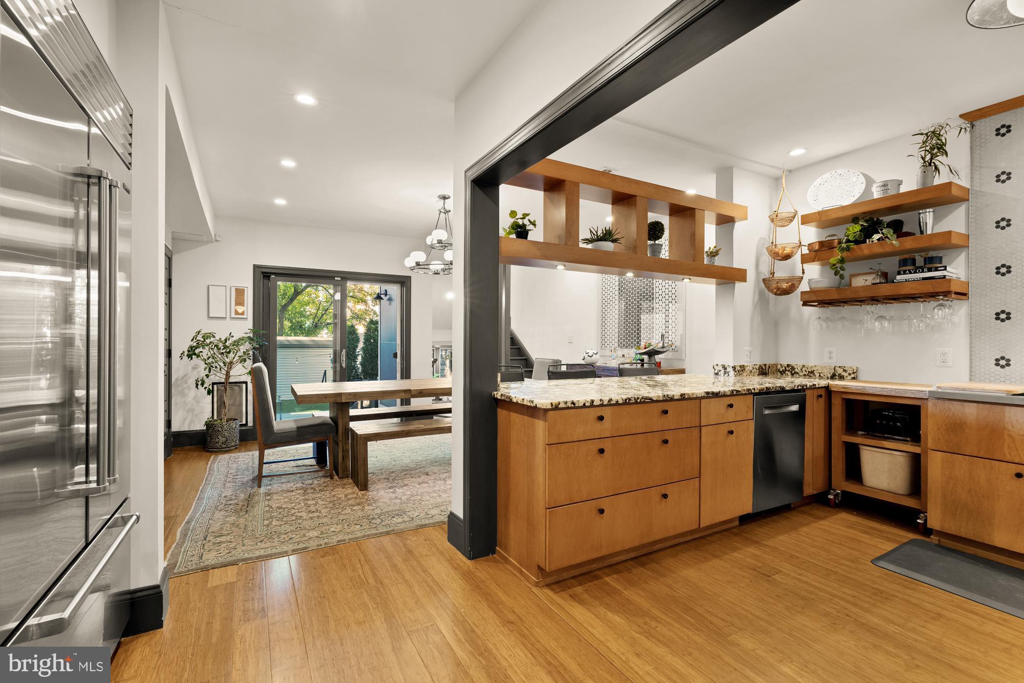 951 14th Street Southeast Washington, DC 20003 - Photo 11 of 50 a kitchen with sink stove and cabinets