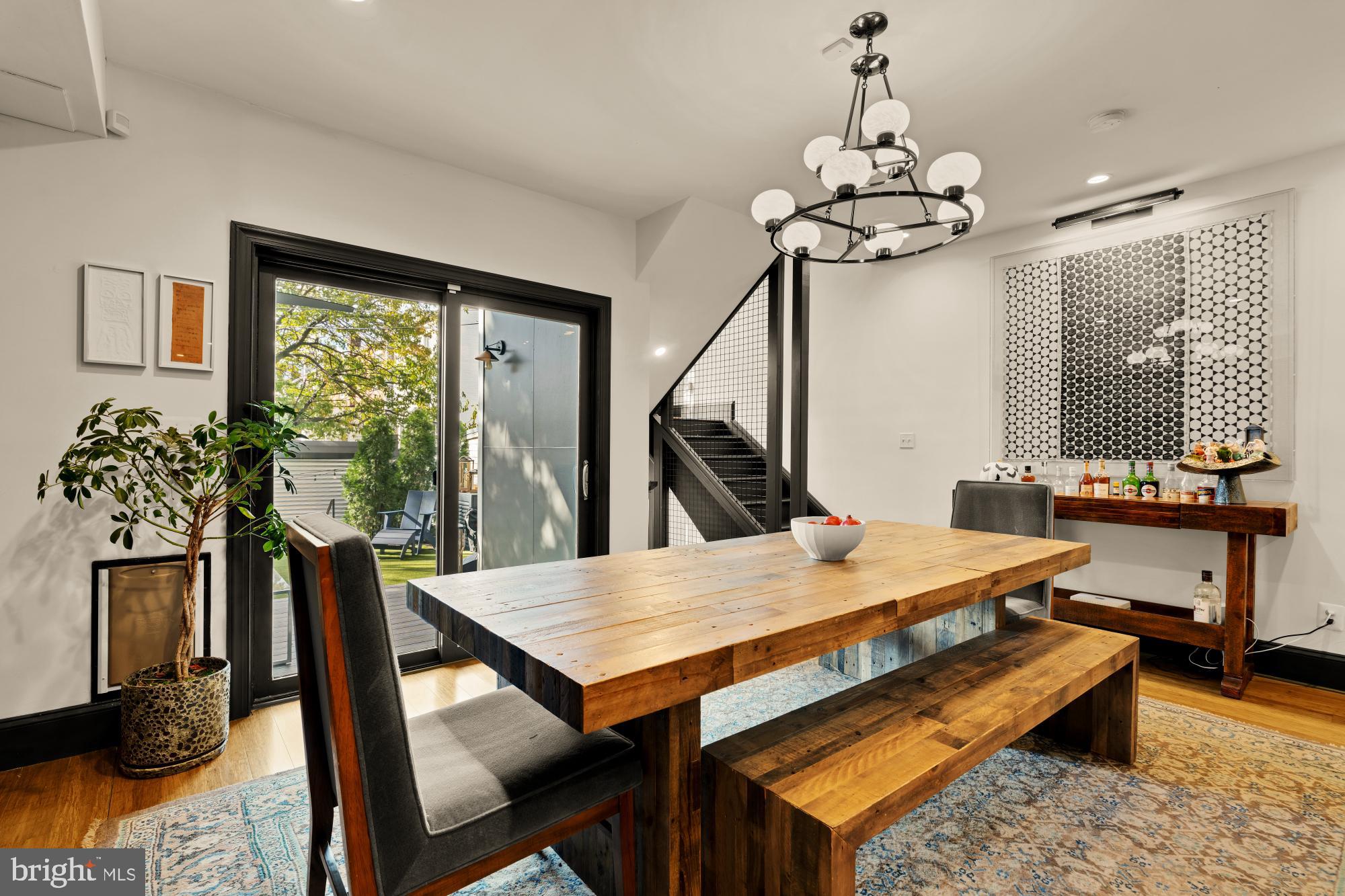 951 14th Street Southeast Washington, DC 20003 - Photo 19 of 50 a view of a dining room with furniture window and wooden floor