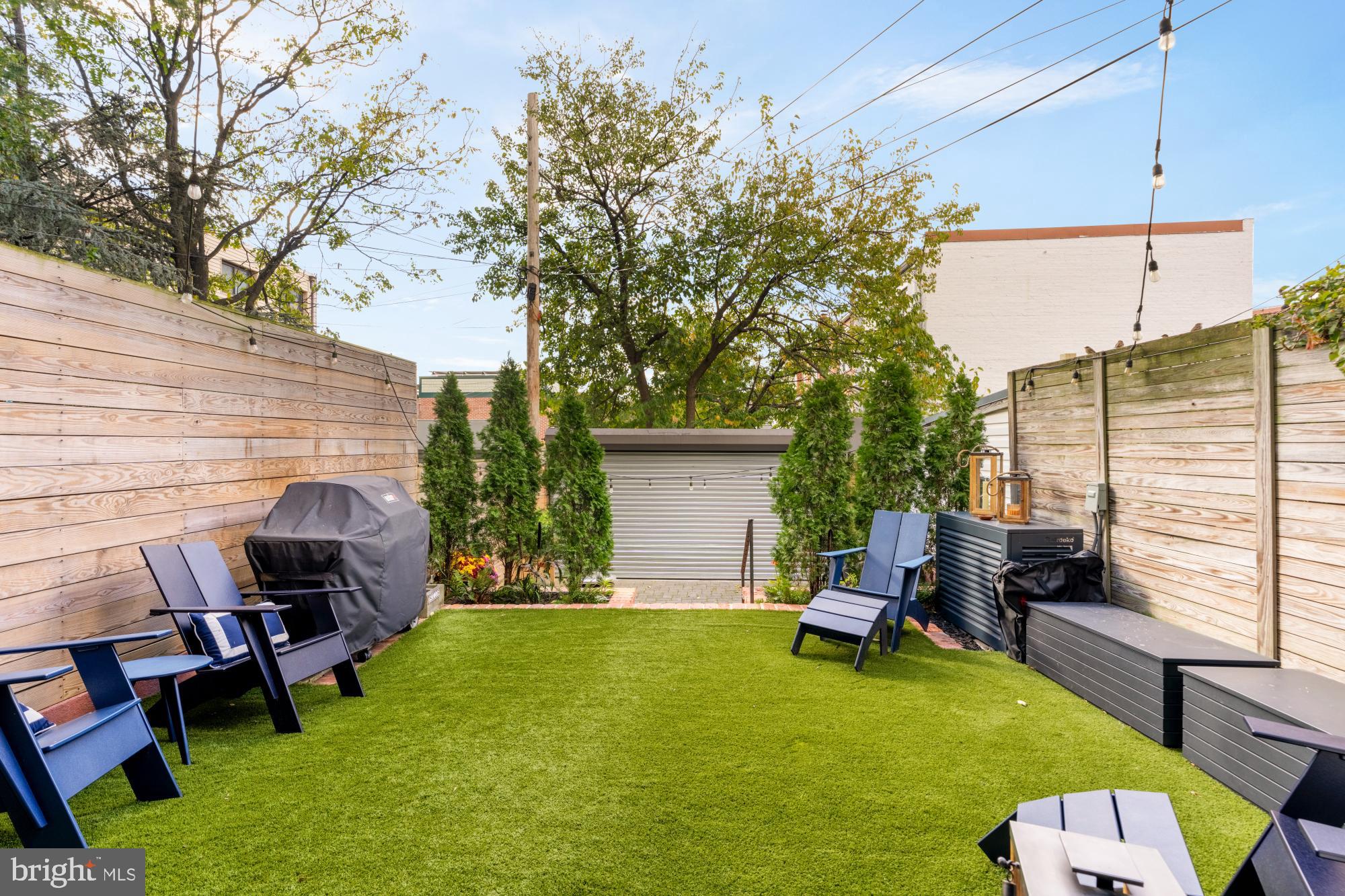 951 14th Street Southeast Washington, DC 20003 - Photo 22 of 50 a backyard of a house with seating space