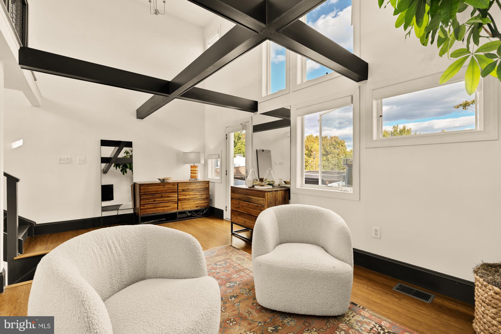951 14th Street Southeast Washington, DC 20003 - Photo 27 of 50 a living room with furniture and a large window