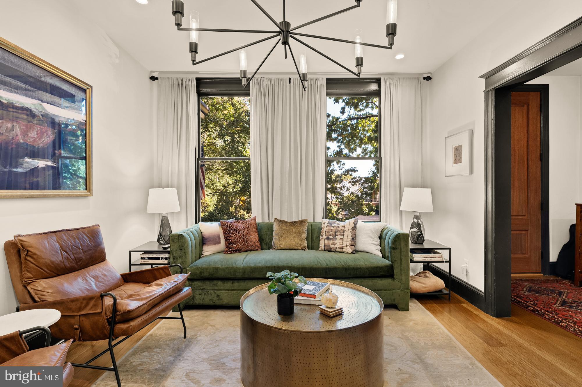 951 14th Street Southeast Washington, DC 20003 - Photo 3 of 50 a living room with furniture and a large window