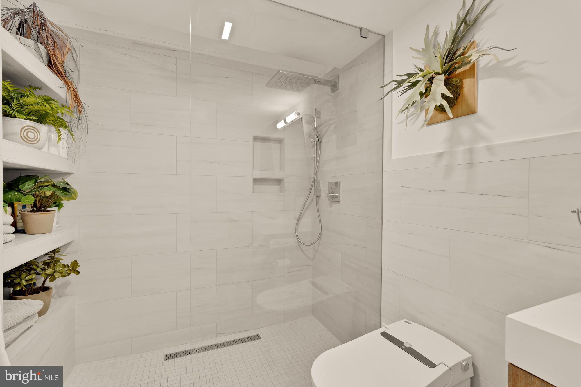 951 14th Street Southeast Washington, DC 20003 - Photo 31 of 50 a bathroom with a toilet and a shower