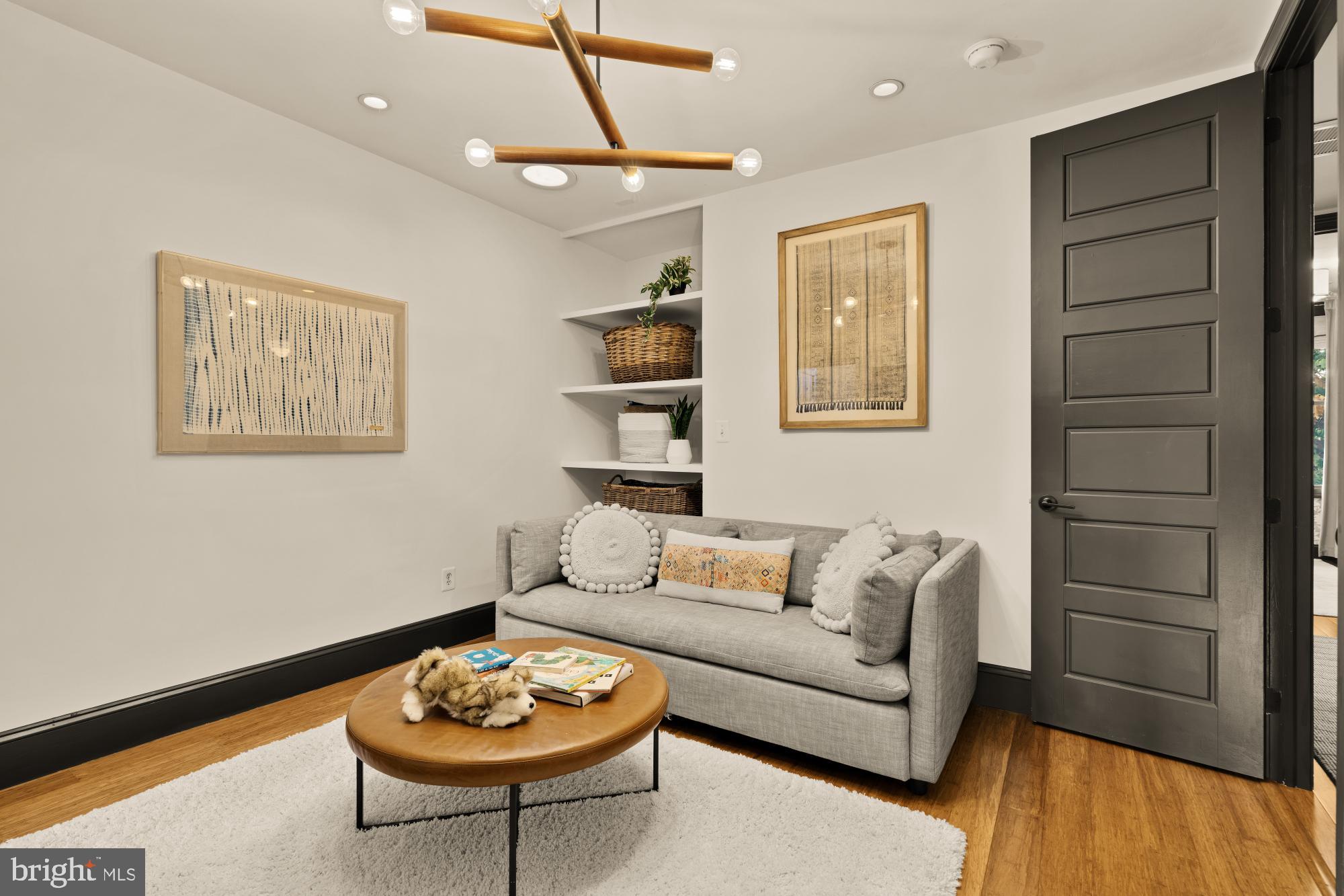 951 14th Street Southeast Washington, DC 20003 - Photo 32 of 50 a living room with furniture and a wooden floor