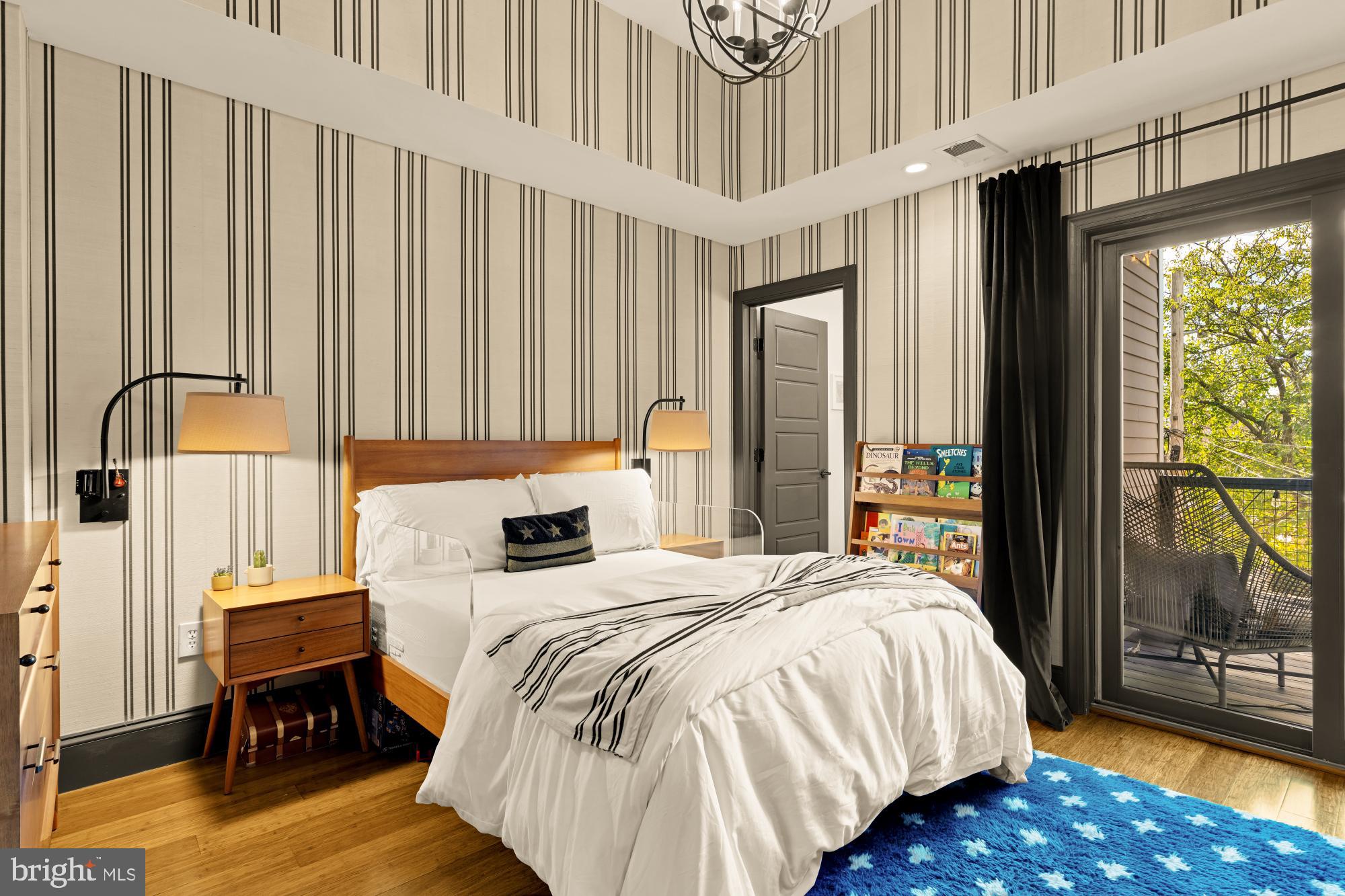 951 14th Street Southeast Washington, DC 20003 - Photo 33 of 50 a bedroom with a bed table and a window