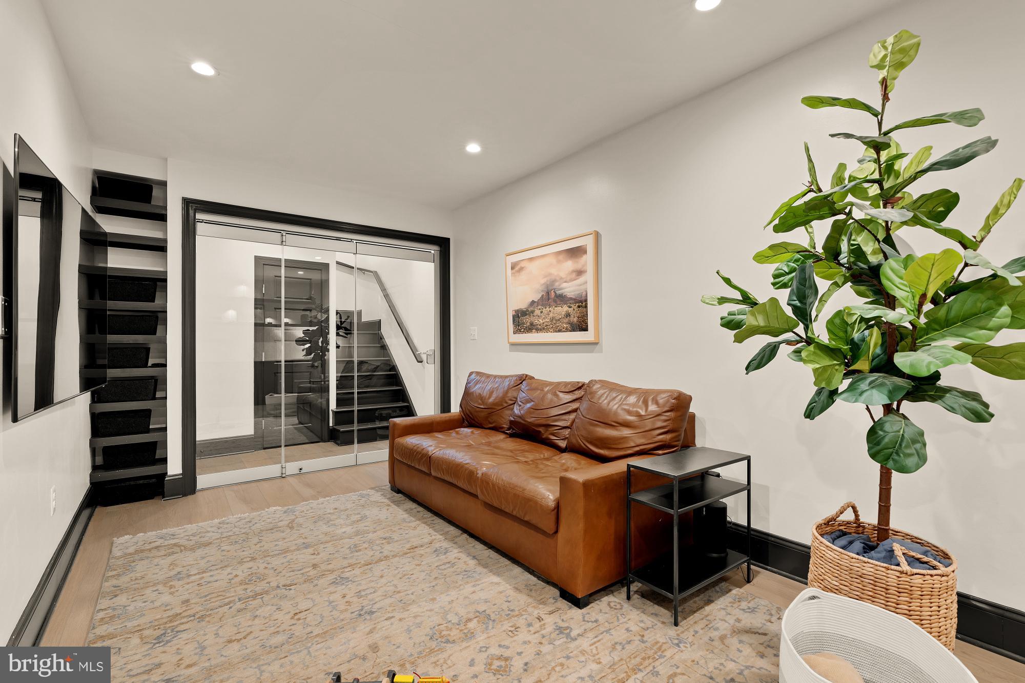 951 14th Street Southeast Washington, DC 20003 - Photo 42 of 50 a living room with furniture flowerpot and a potted plant