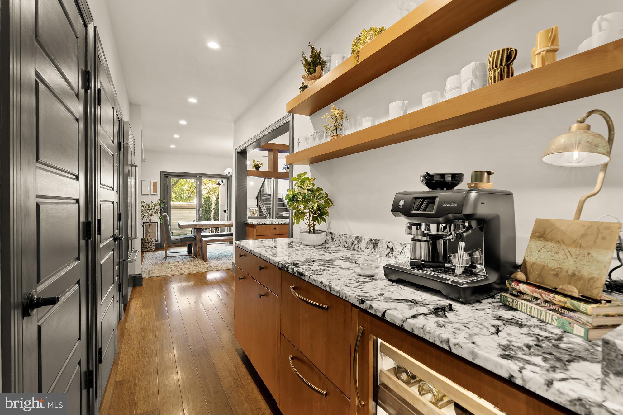 951 14th Street Southeast Washington, DC 20003 - Photo 10 of 50 a kitchen with counter top space cabinets and stainless steel appliances