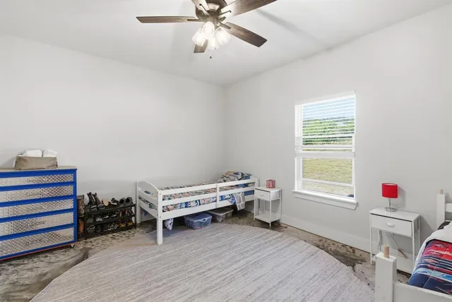 a room with furniture and a window