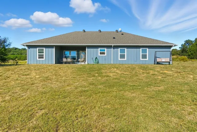 a front view of house with yard