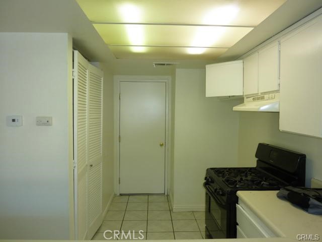840 East Cedar Street Ontario, CA 91761 - Photo 13 of 14 a bathroom with a sink and a mirror
