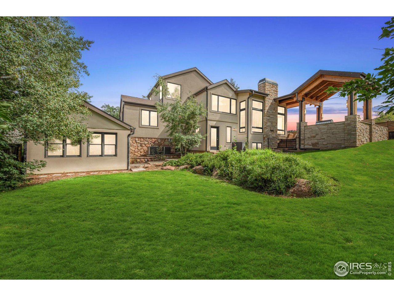 707 8th Street Boulder, CO 80302 - Photo 36 of 37 a view of a front of a house with a yard