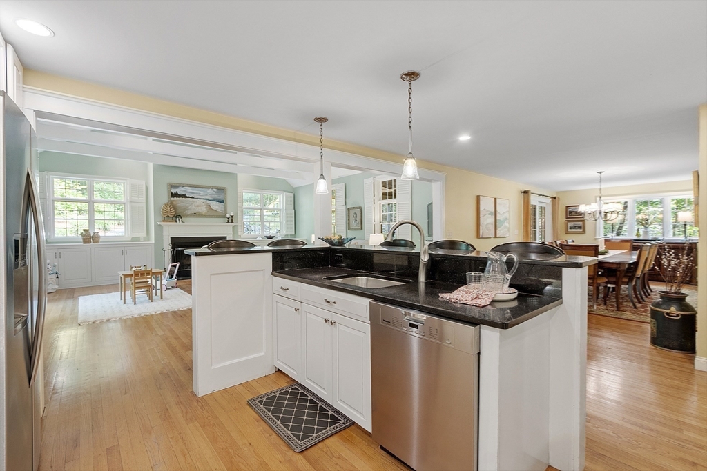 62 Waite Road Boxborough, MA 01719 - Photo 11 of 41 a kitchen with lots of counter top space and wooden floor