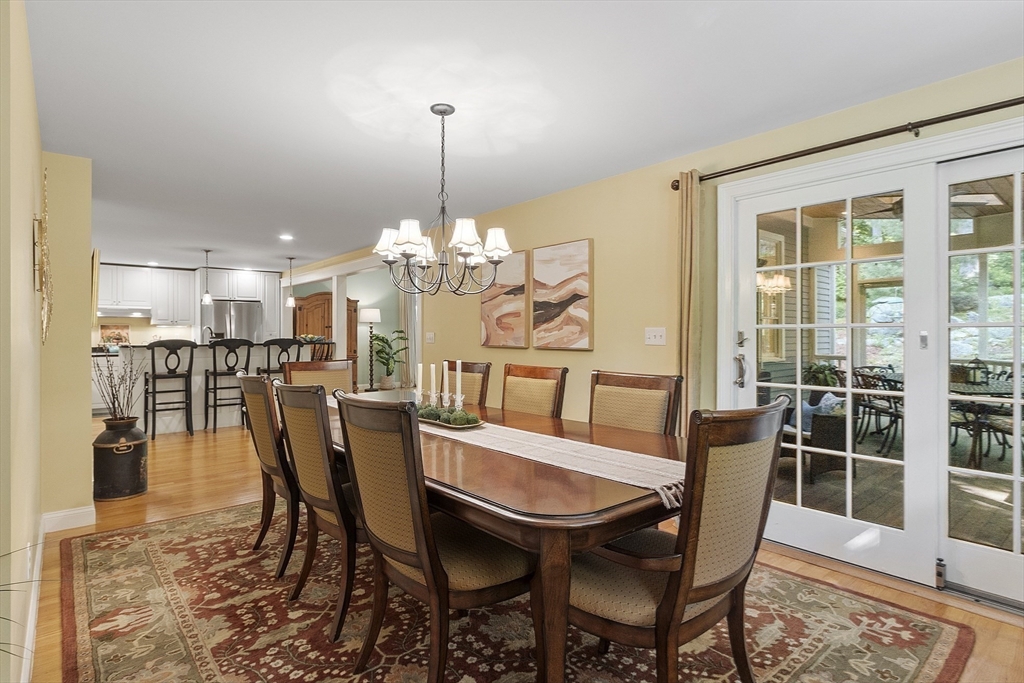 62 Waite Road Boxborough, MA 01719 - Photo 12 of 41 a view of a dining room with furniture and wooden floor