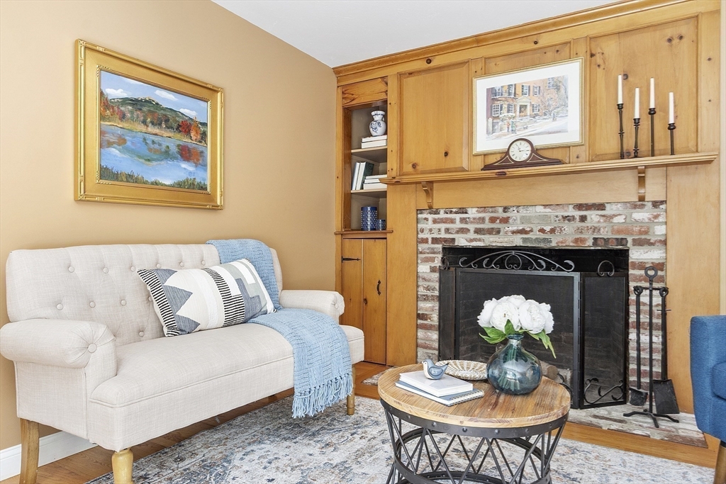 62 Waite Road Boxborough, MA 01719 - Photo 15 of 41 a living room with furniture and a fireplace