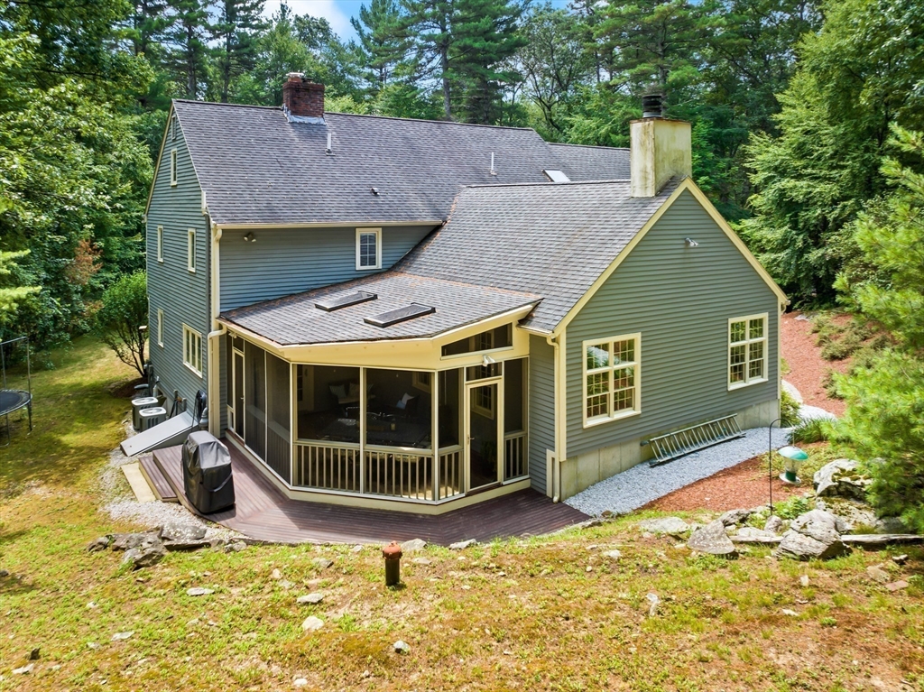 62 Waite Road Boxborough, MA 01719 - Photo 2 of 41 a view of a house with a yard and sitting area