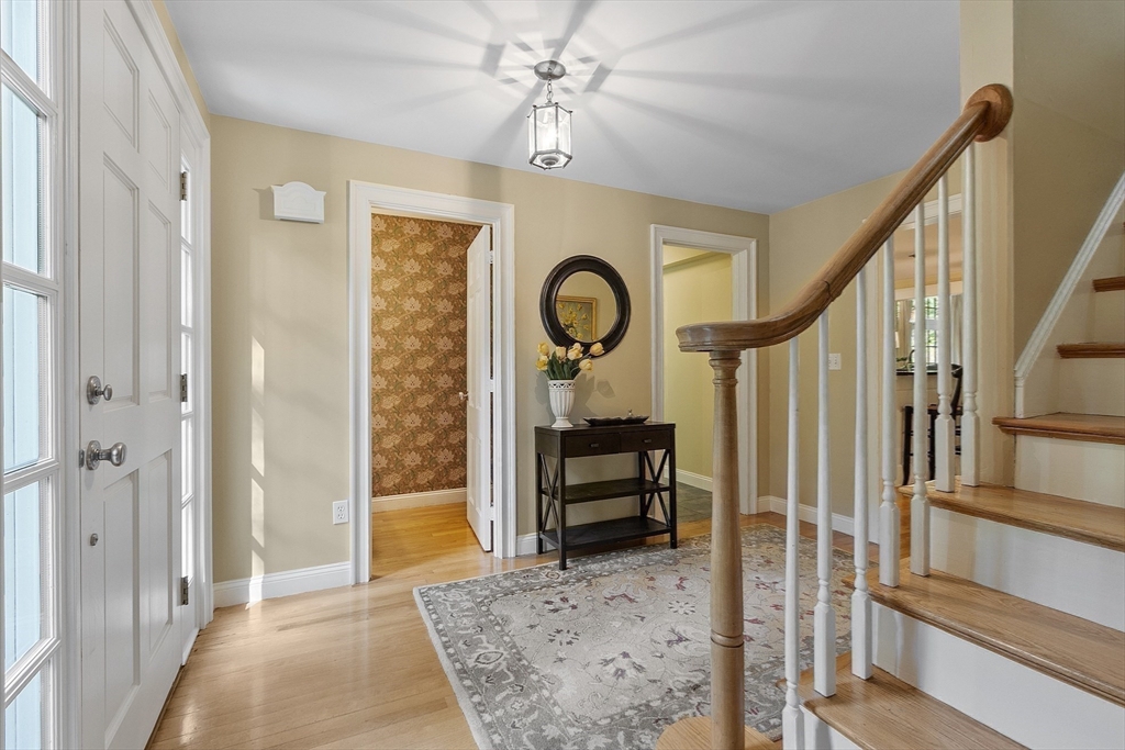 62 Waite Road Boxborough, MA 01719 - Photo 21 of 41 a view of entryway bedroom and hall with wooden floor
