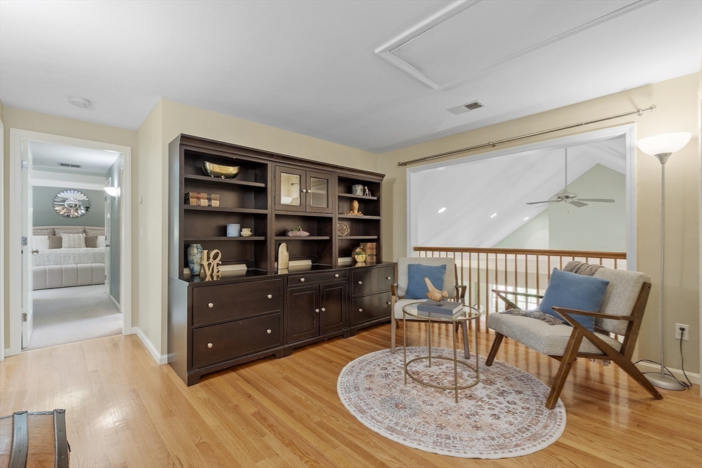 62 Waite Road Boxborough, MA 01719 - Photo 23 of 41 a room with furniture and wooden floor