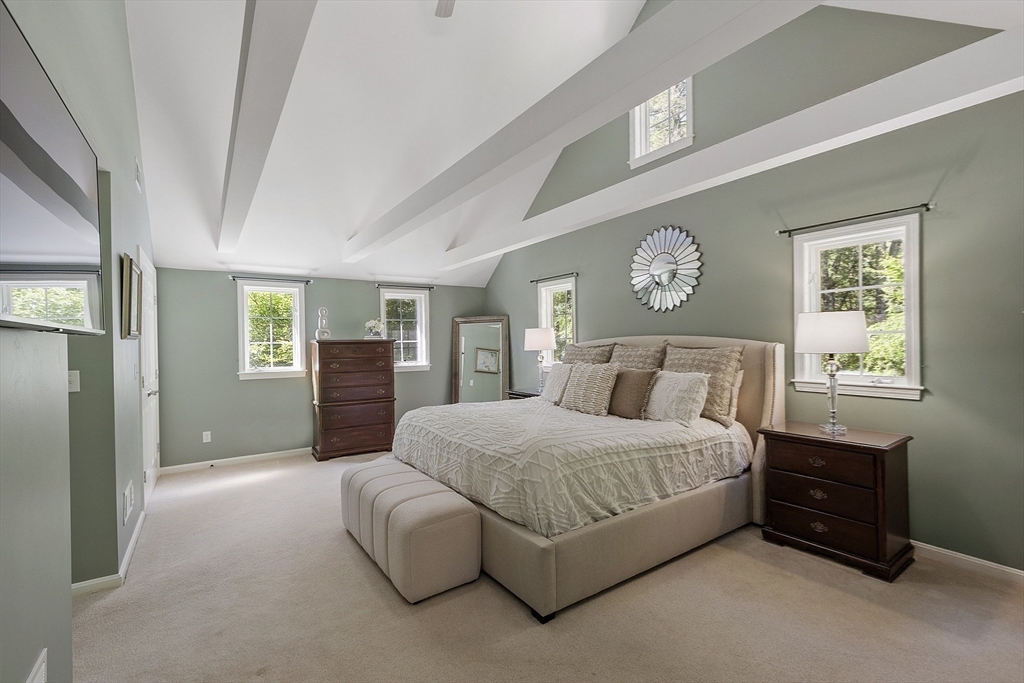 62 Waite Road Boxborough, MA 01719 - Photo 27 of 41 a bedroom with a large bed and a closet