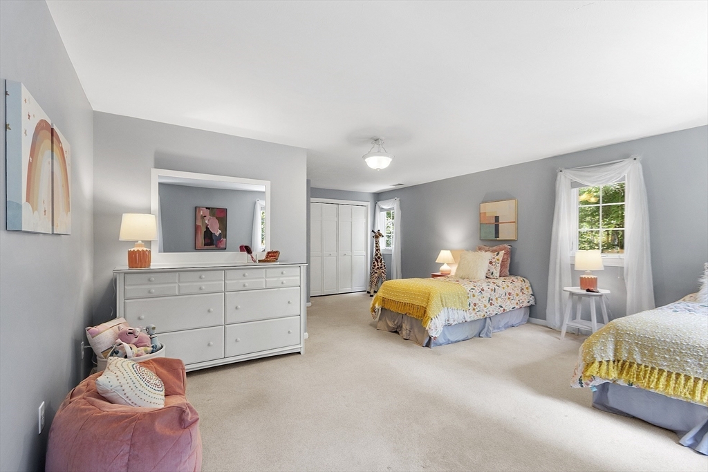 62 Waite Road Boxborough, MA 01719 - Photo 30 of 41 a bed room with a bed and a couch