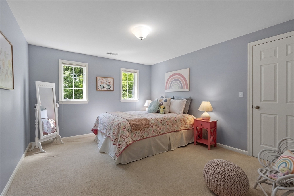 62 Waite Road Boxborough, MA 01719 - Photo 32 of 41 a spacious bedroom with two beds and a window