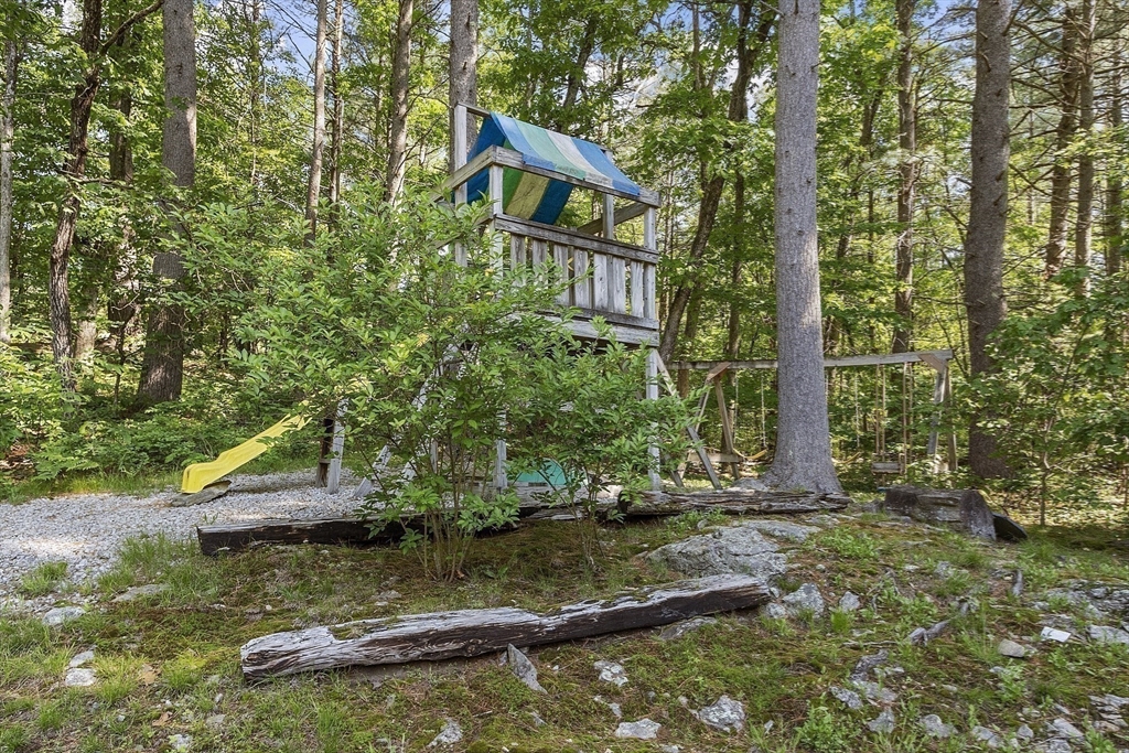 62 Waite Road Boxborough, MA 01719 - Photo 37 of 41 a view of a house with a yard and sitting area