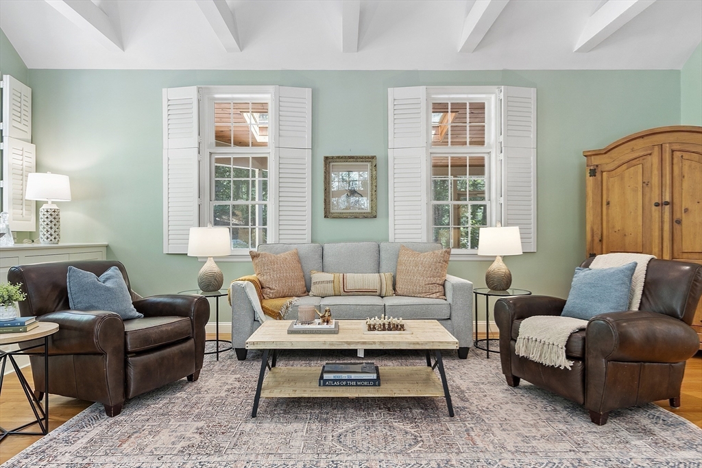 62 Waite Road Boxborough, MA 01719 - Photo 6 of 41 a living room with furniture wooden floor and a table