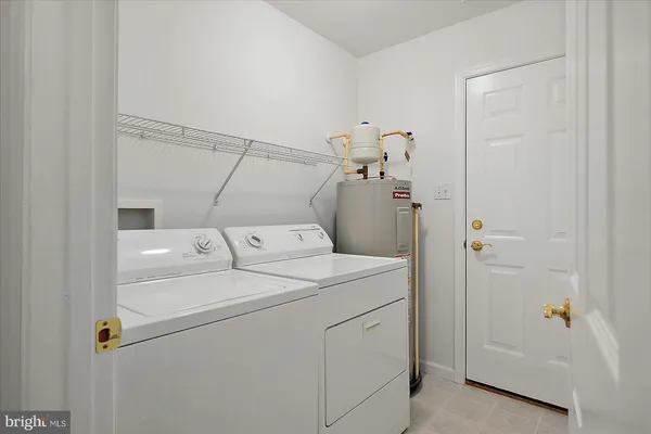 a view of a chairs and table in patio