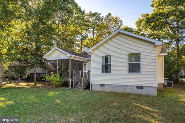 a view of a tree in a yard