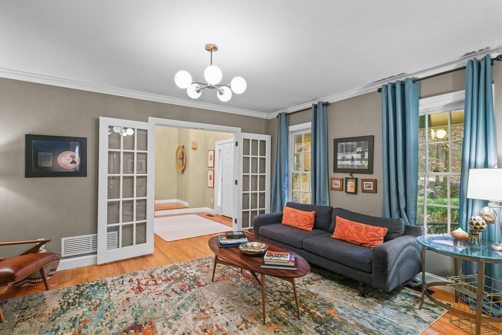 20 Barnside Road Boxford, MA 01921 - Photo 13 of 42 a living room with furniture a wooden floor and a window
