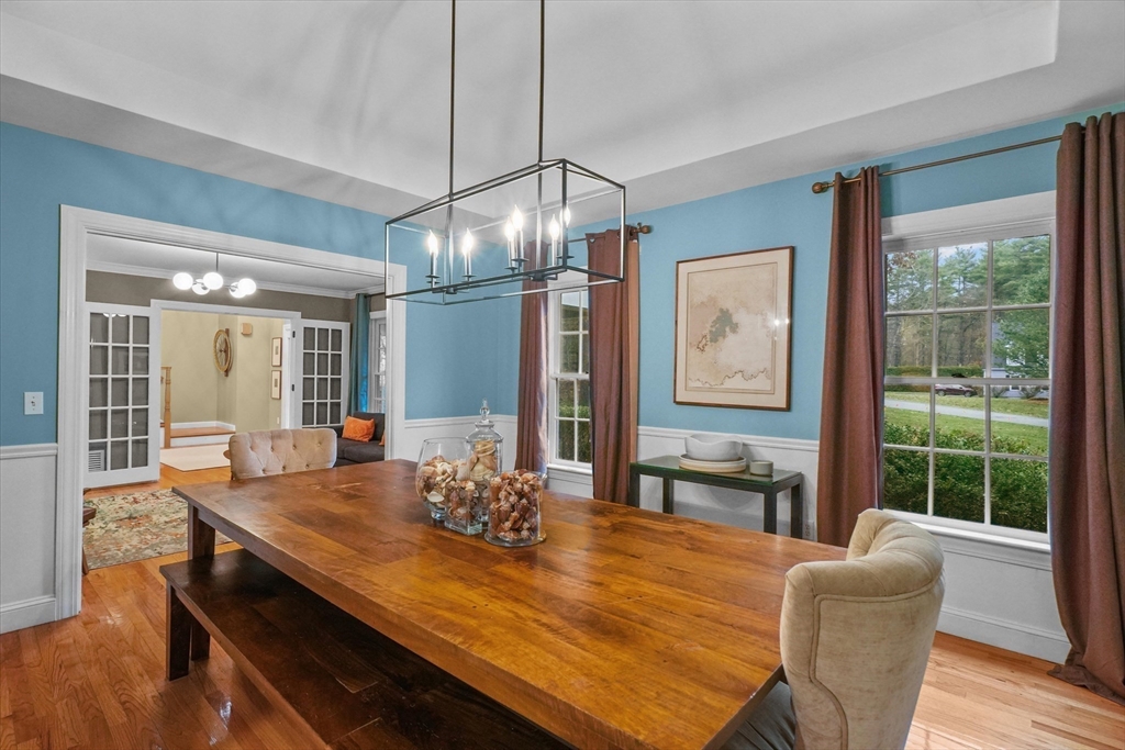 20 Barnside Road Boxford, MA 01921 - Photo 14 of 42 a view of a dining room with furniture window and wooden floor