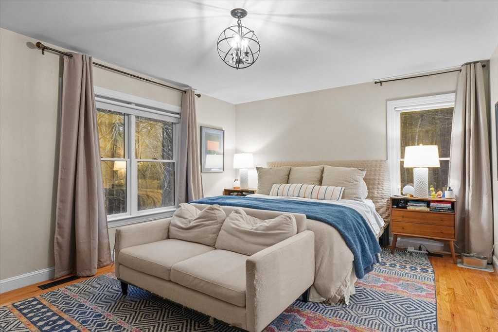 20 Barnside Road Boxford, MA 01921 - Photo 15 of 42 a bedroom with a bed lamps and window
