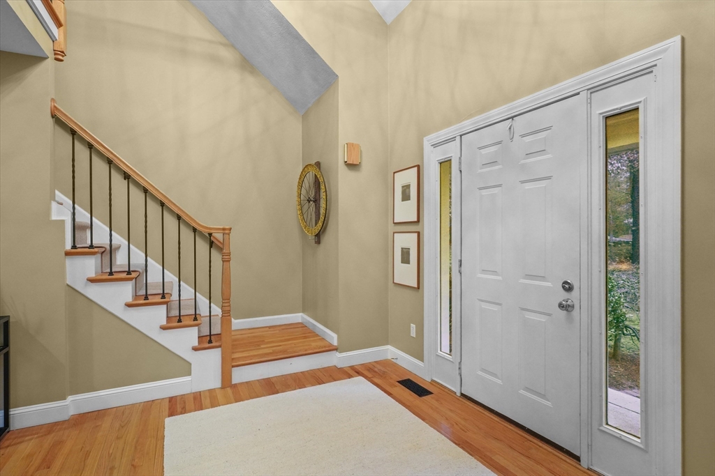 20 Barnside Road Boxford, MA 01921 - Photo 21 of 42 a view of a hallway with wooden floor and staircase