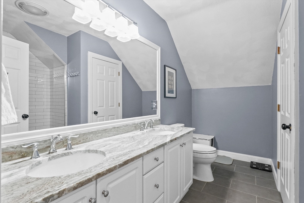 20 Barnside Road Boxford, MA 01921 - Photo 26 of 42 a bathroom with a granite countertop sink a toilet and a mirror