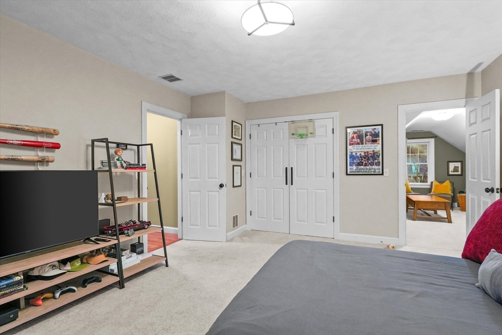 20 Barnside Road Boxford, MA 01921 - Photo 28 of 42 a view of a livingroom with furniture and gym equipment