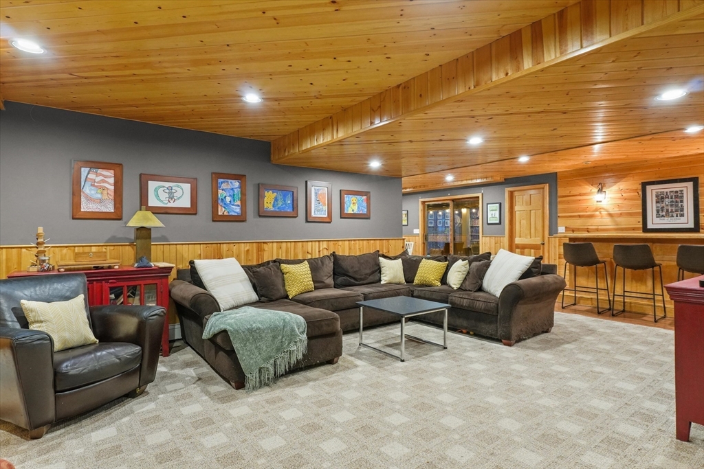 20 Barnside Road Boxford, MA 01921 - Photo 32 of 42 a living room with furniture and a ceiling fan
